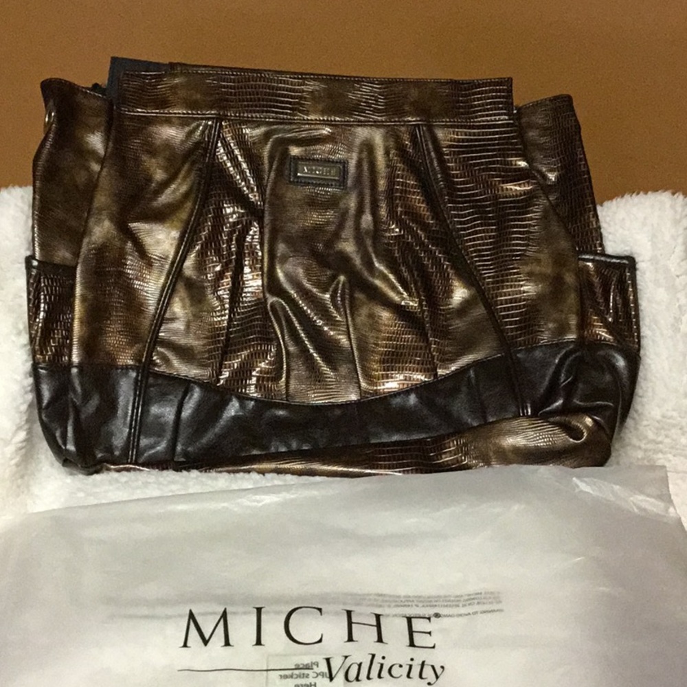 Miche prima purse shell. Gold and bronze.